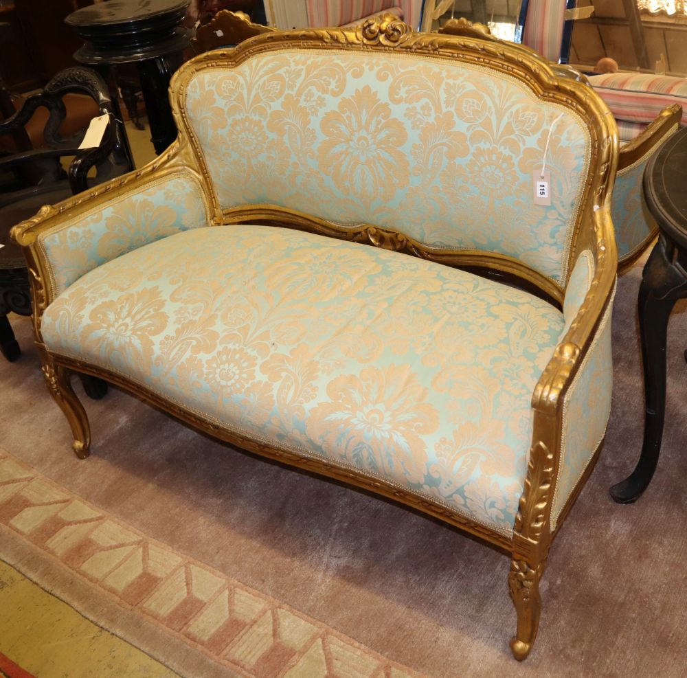 A Dutch giltwood and damask three piece suite, settee W.132cm, D.70cm, H.98cm